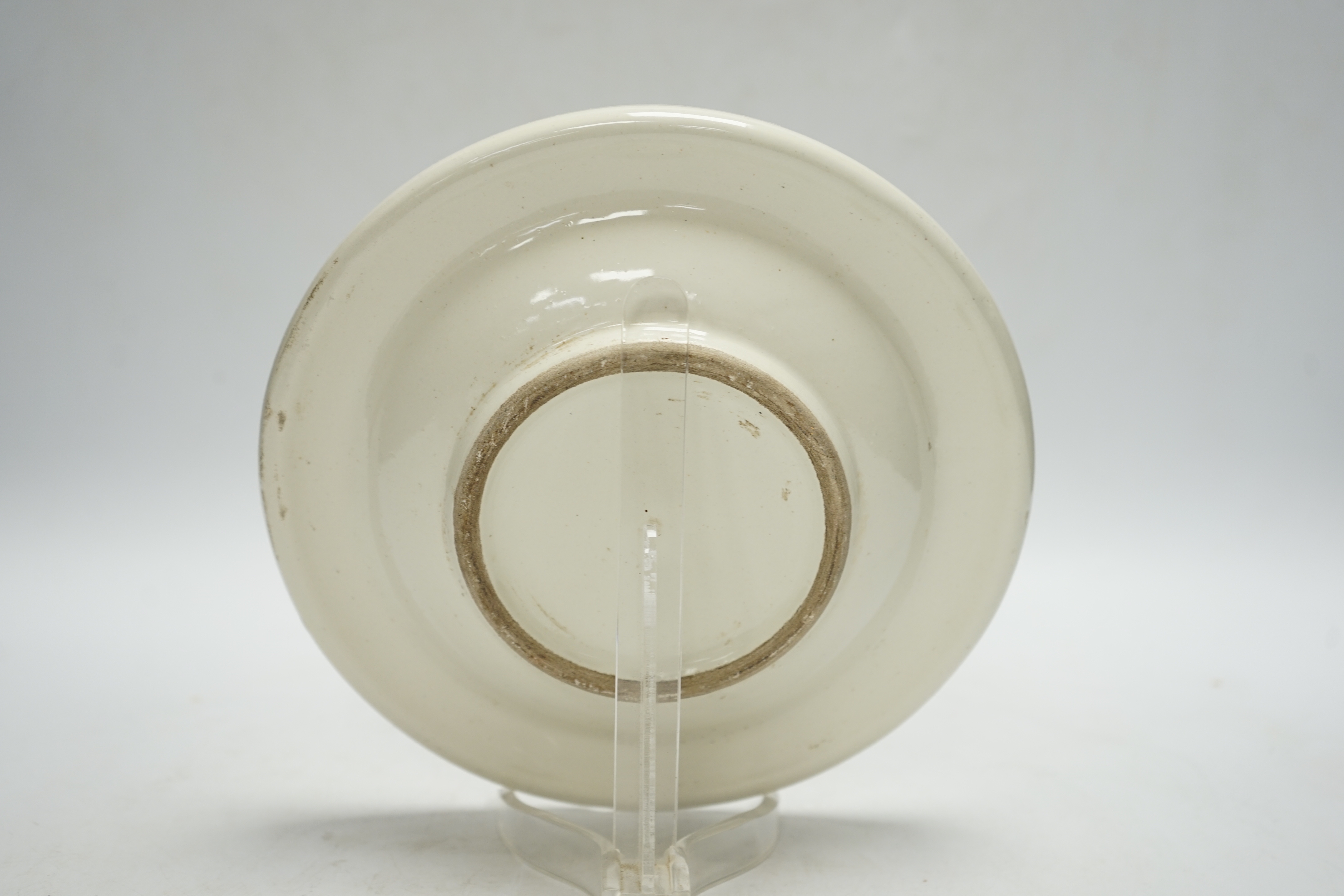 A Spanish maiolica ashtray, bearing date 1898, 21cm diameter
